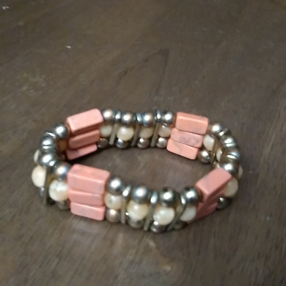 Beaded blaclet. Coral and silver color.